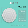 Cross-grain embossed disc cotton pad